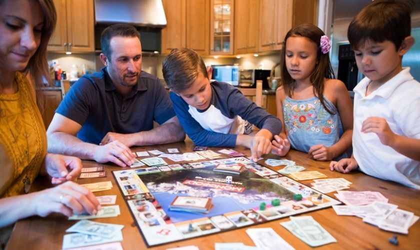 Family playing boardgame